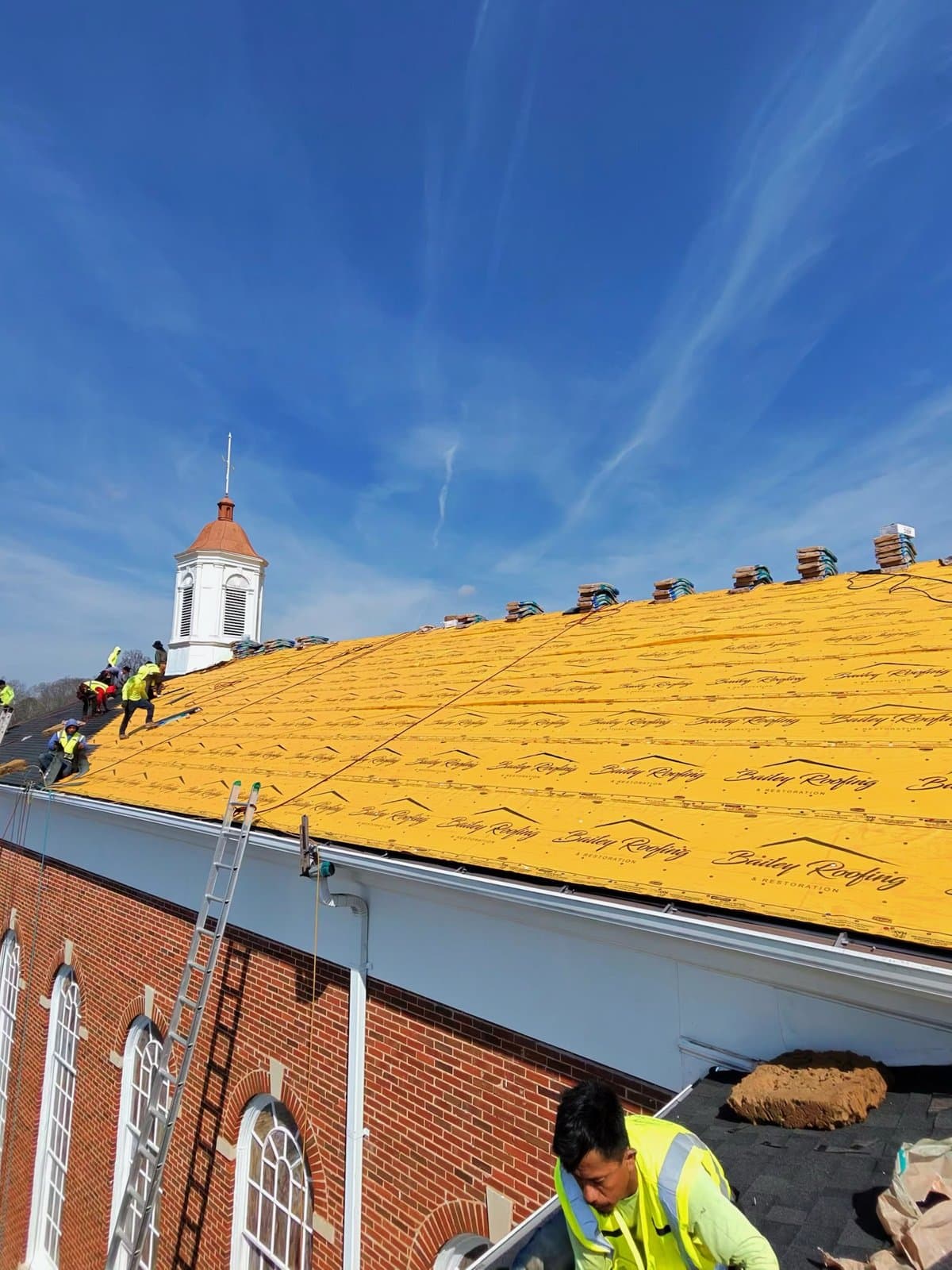 Bailey crew installing a roof over Bailey-branded underlayment