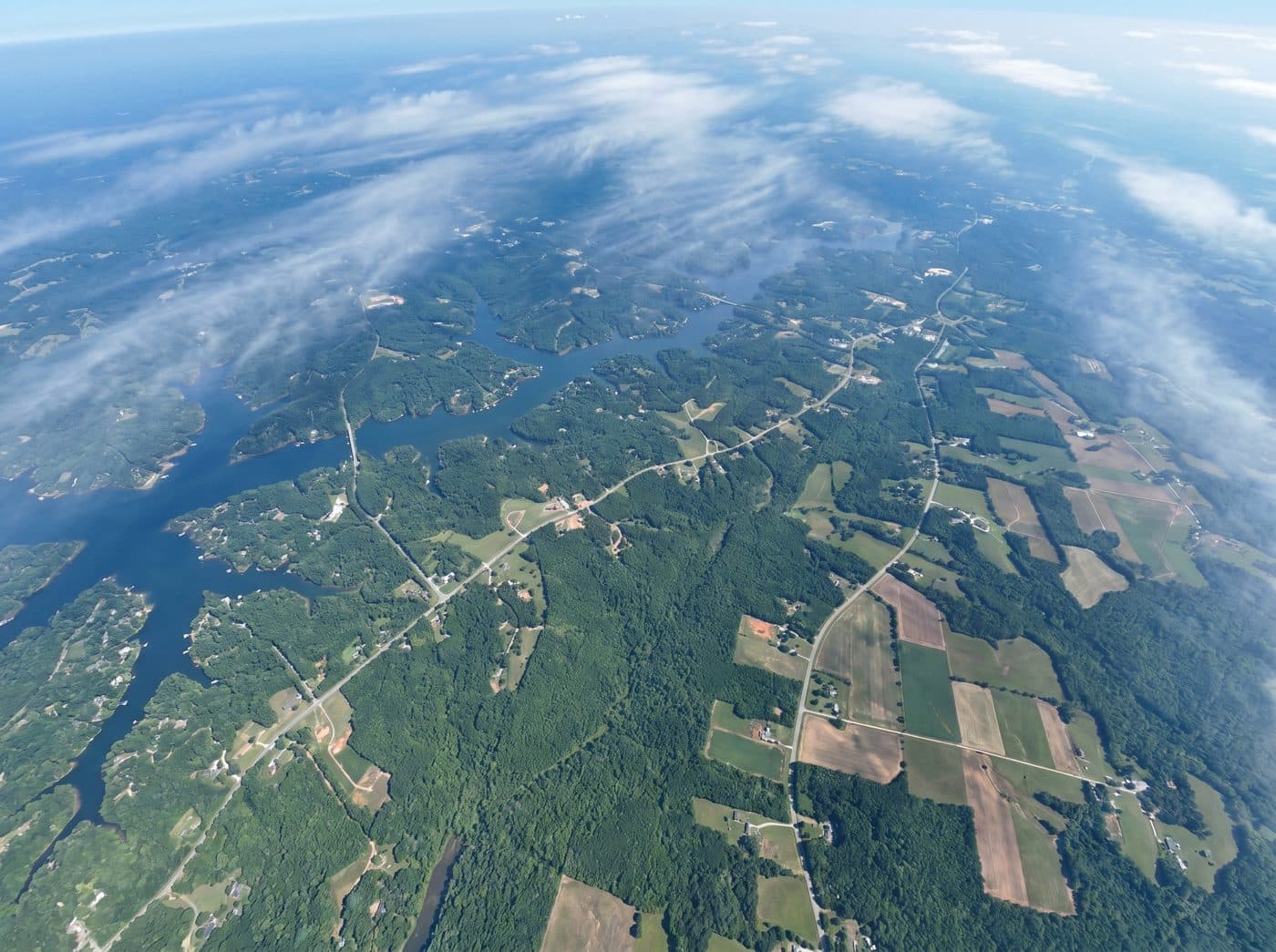 Satellite view zooming into North Georgia from orbit for an instant roof measurement