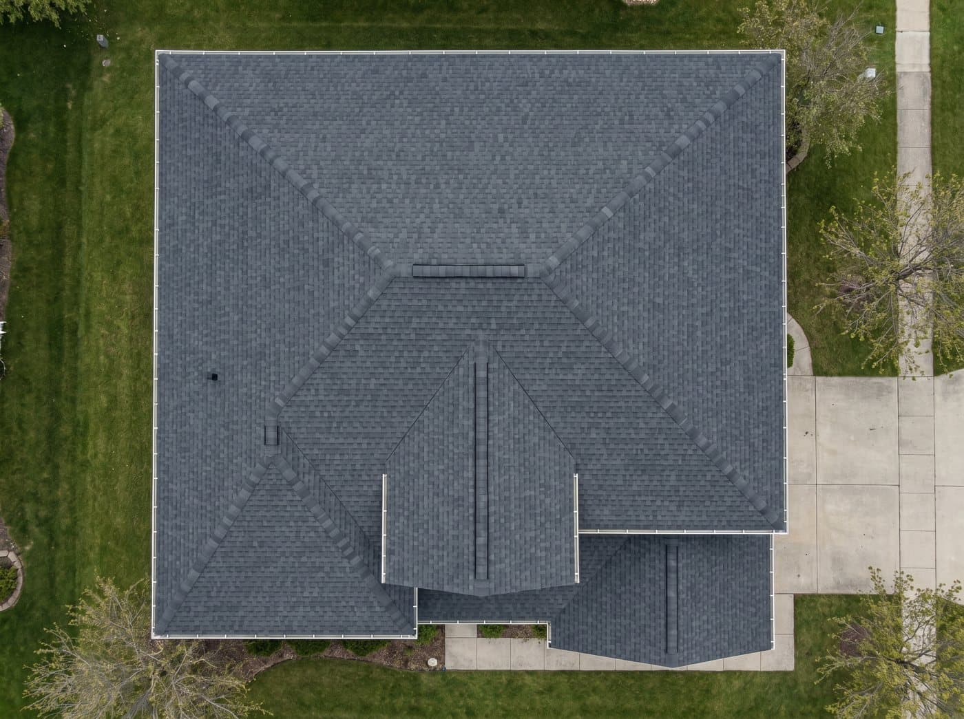 Top-down satellite view of a single Buford, GA home's roof, measured for an instant estimate